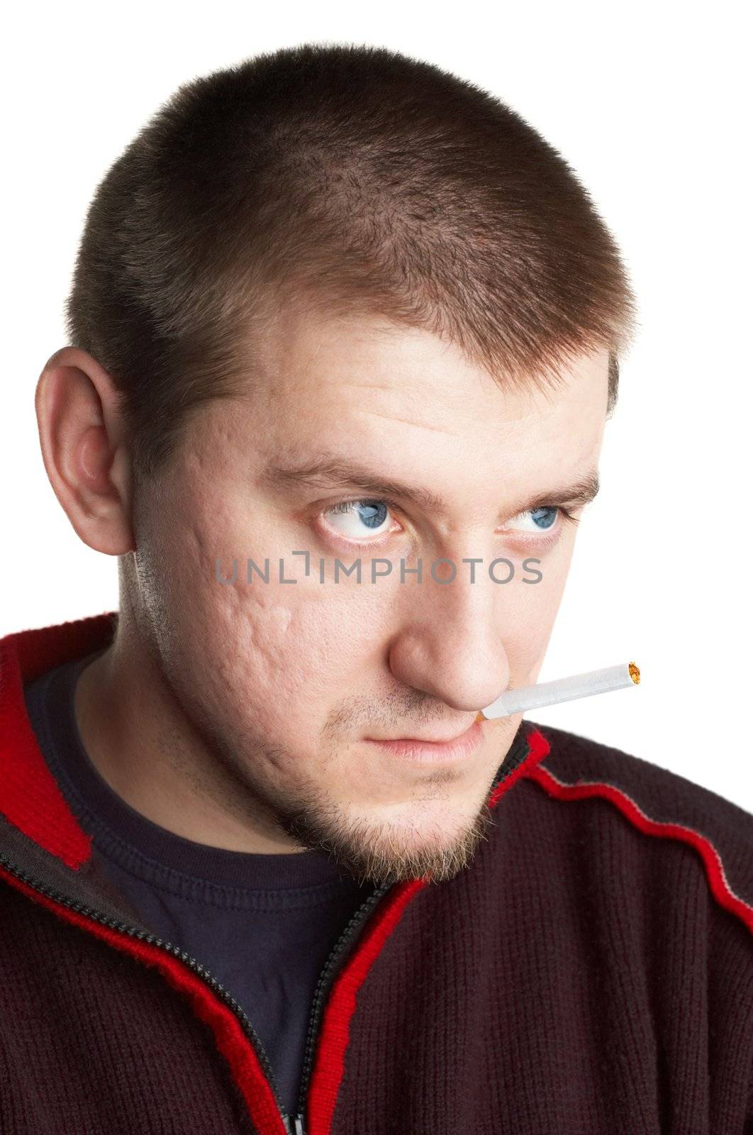 casual short haired young man posing with cigarette