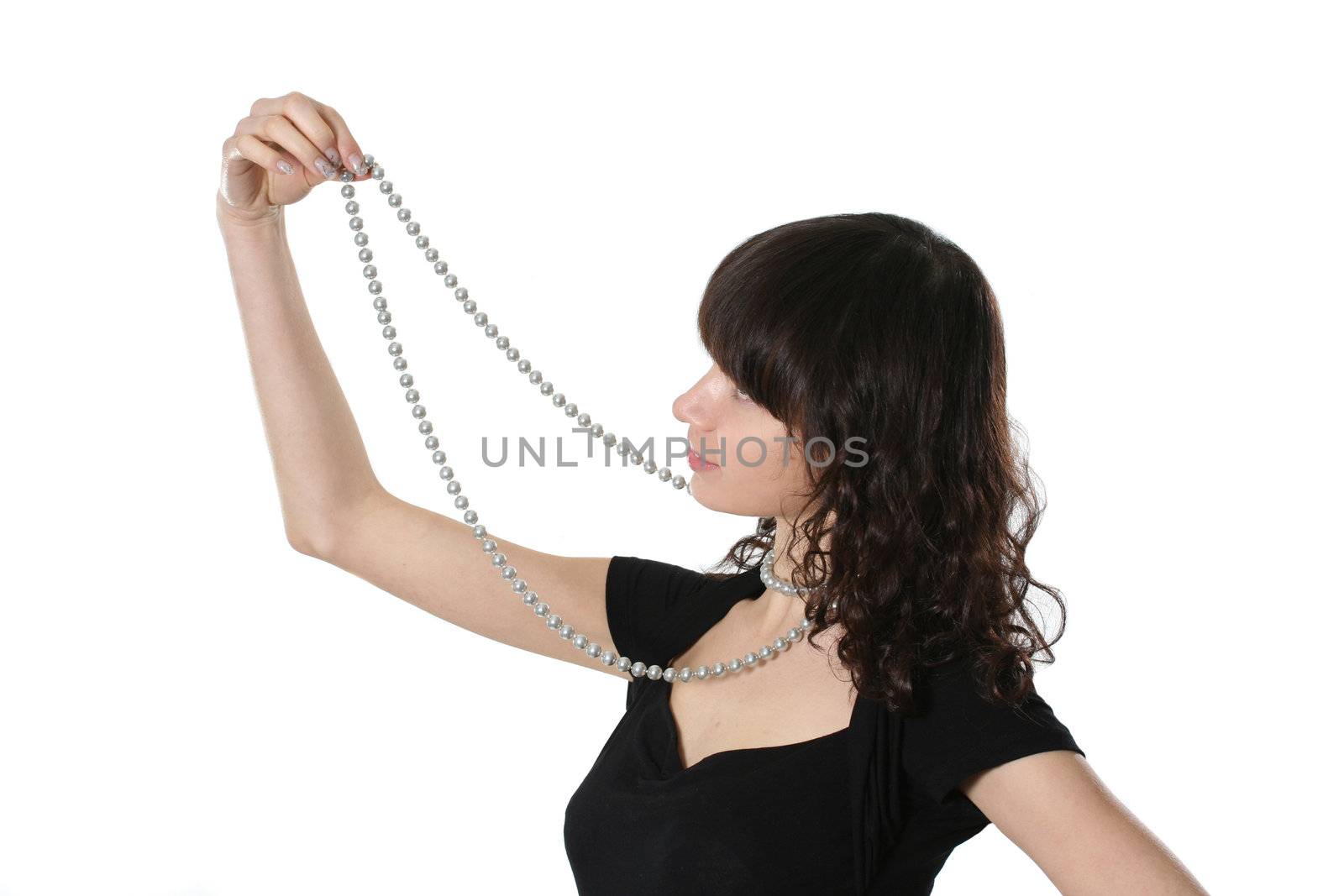 Portrait of the beautiful woman with a pearl necklace