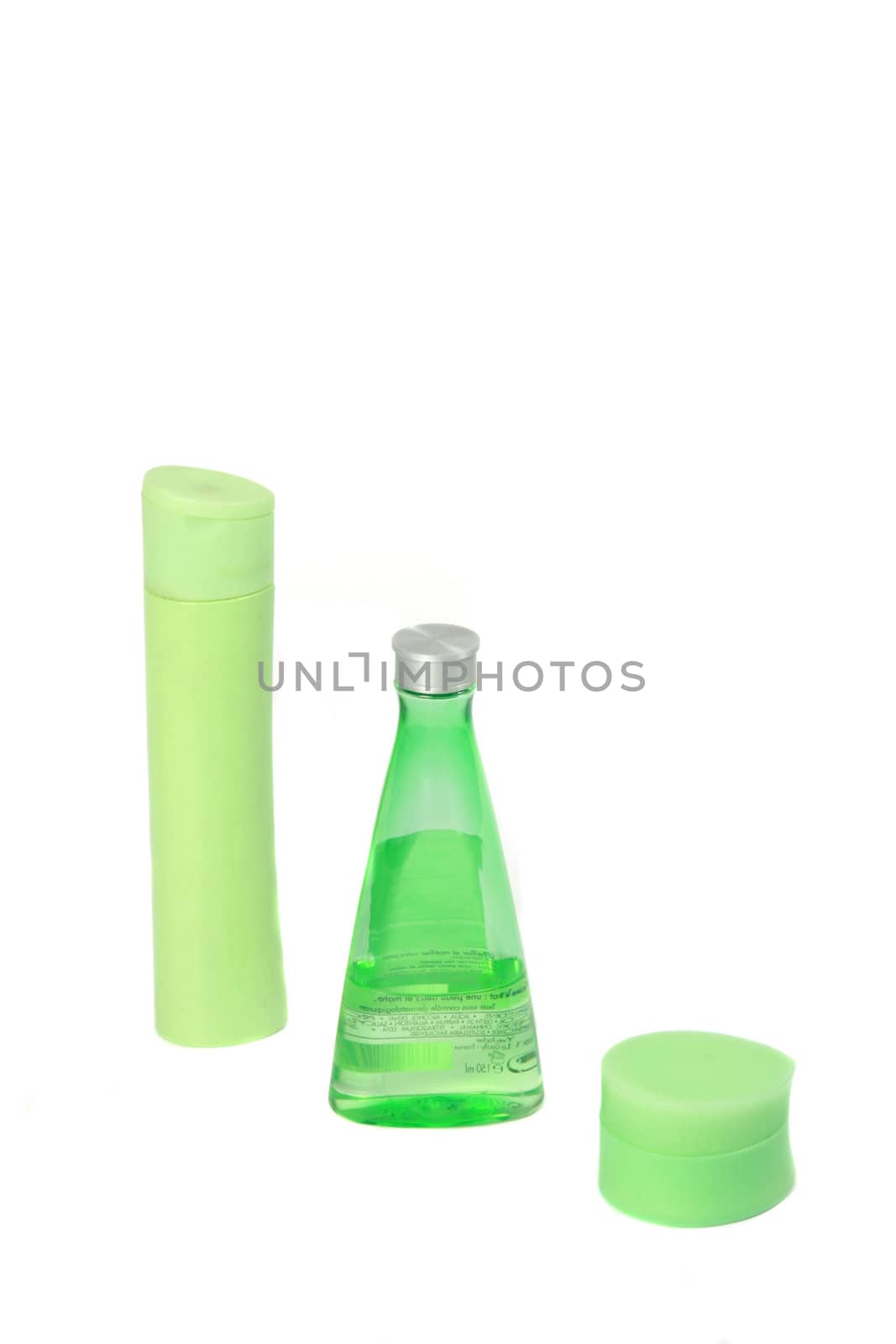 Green jar with medical cosmetics on a white background