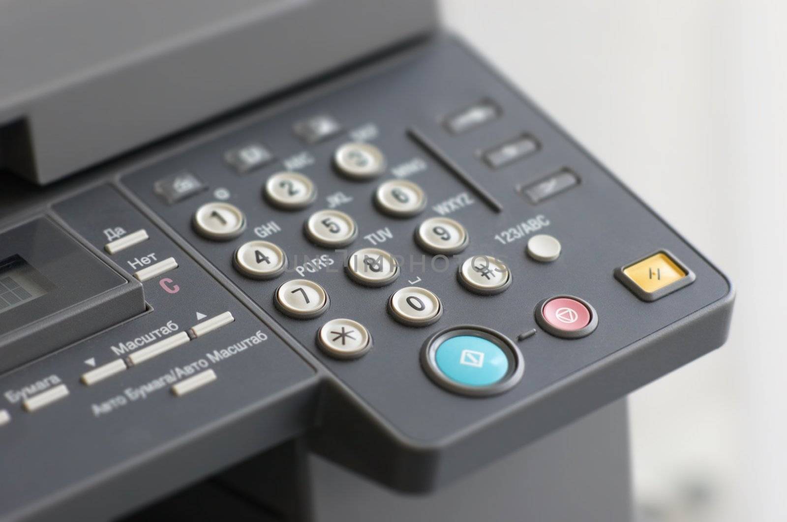 alpha-numeric keyboard pad of office copier. selective focus.