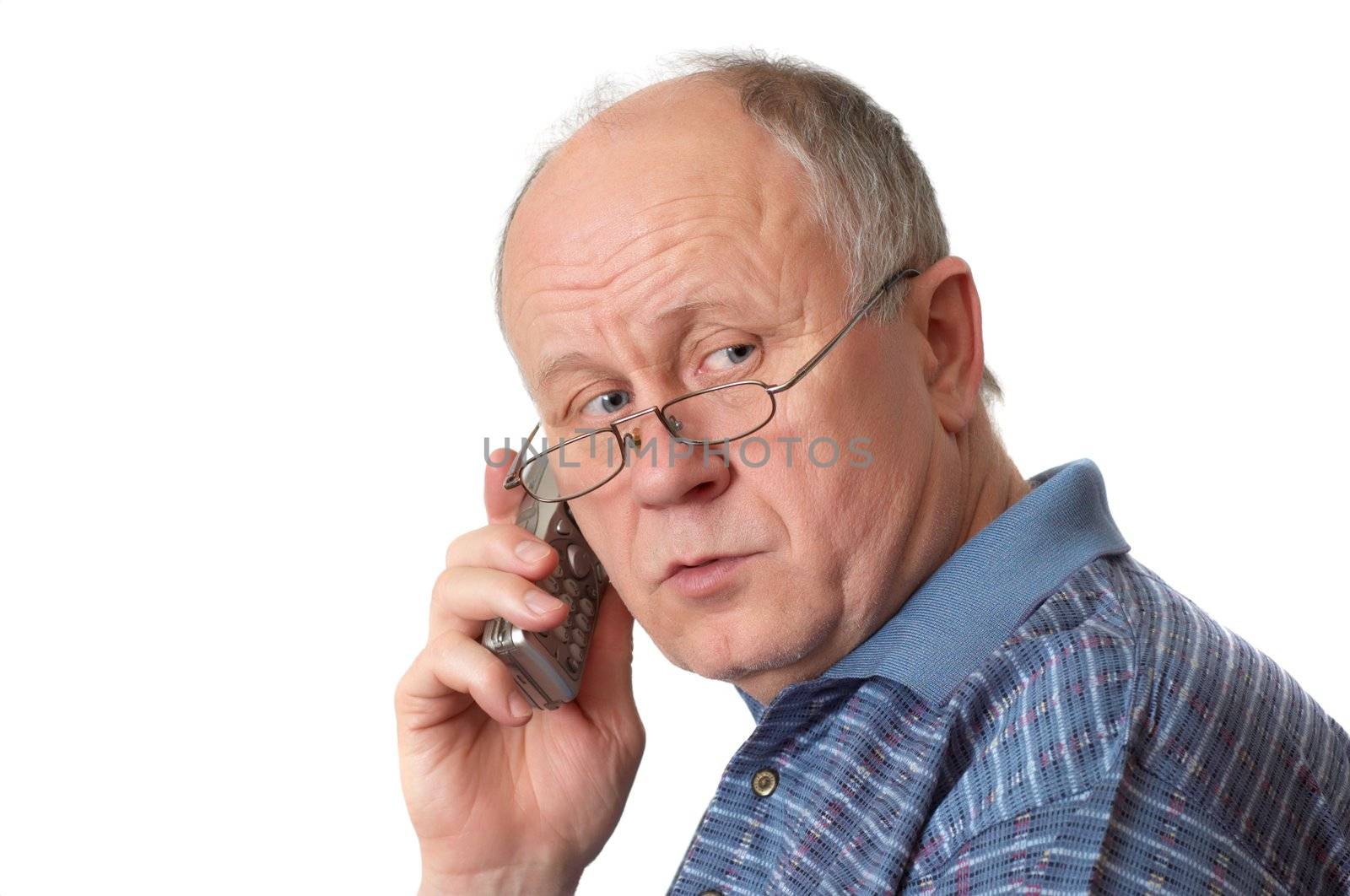 Bald senior man talking on the phone. Isolated on white.