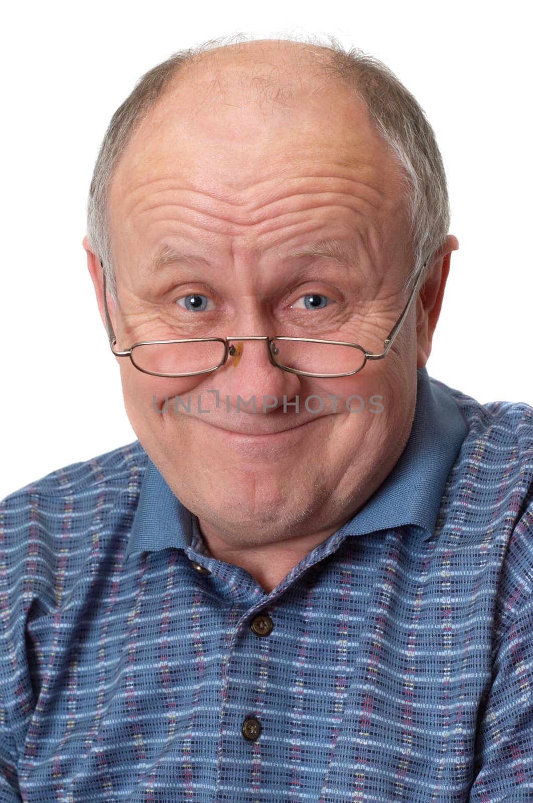 Bald senior man fooling around. Isolated on white. Emotional portraits series.