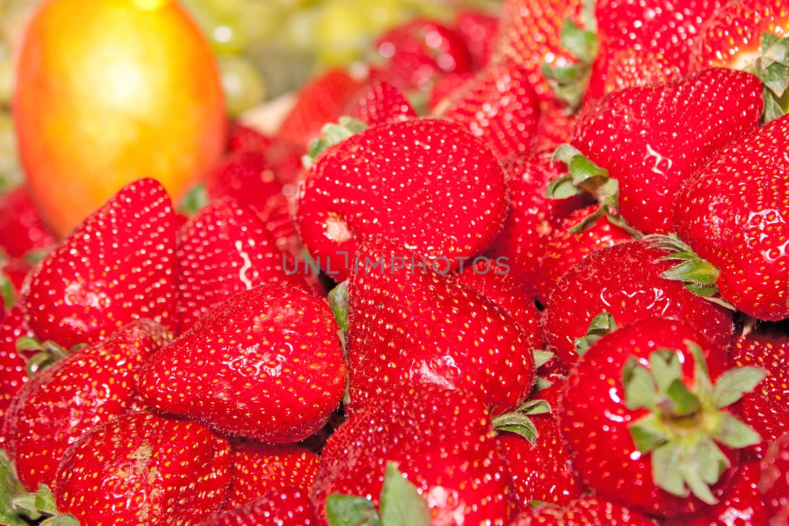 Background of the first strawberries of the season
