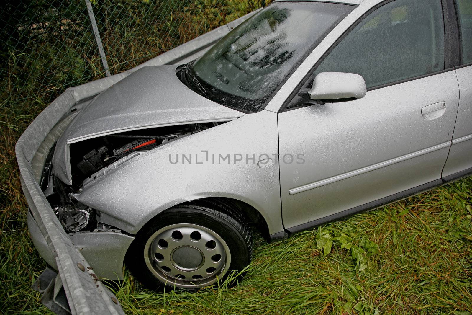 Front of new car after a car crash. Drunken driving?