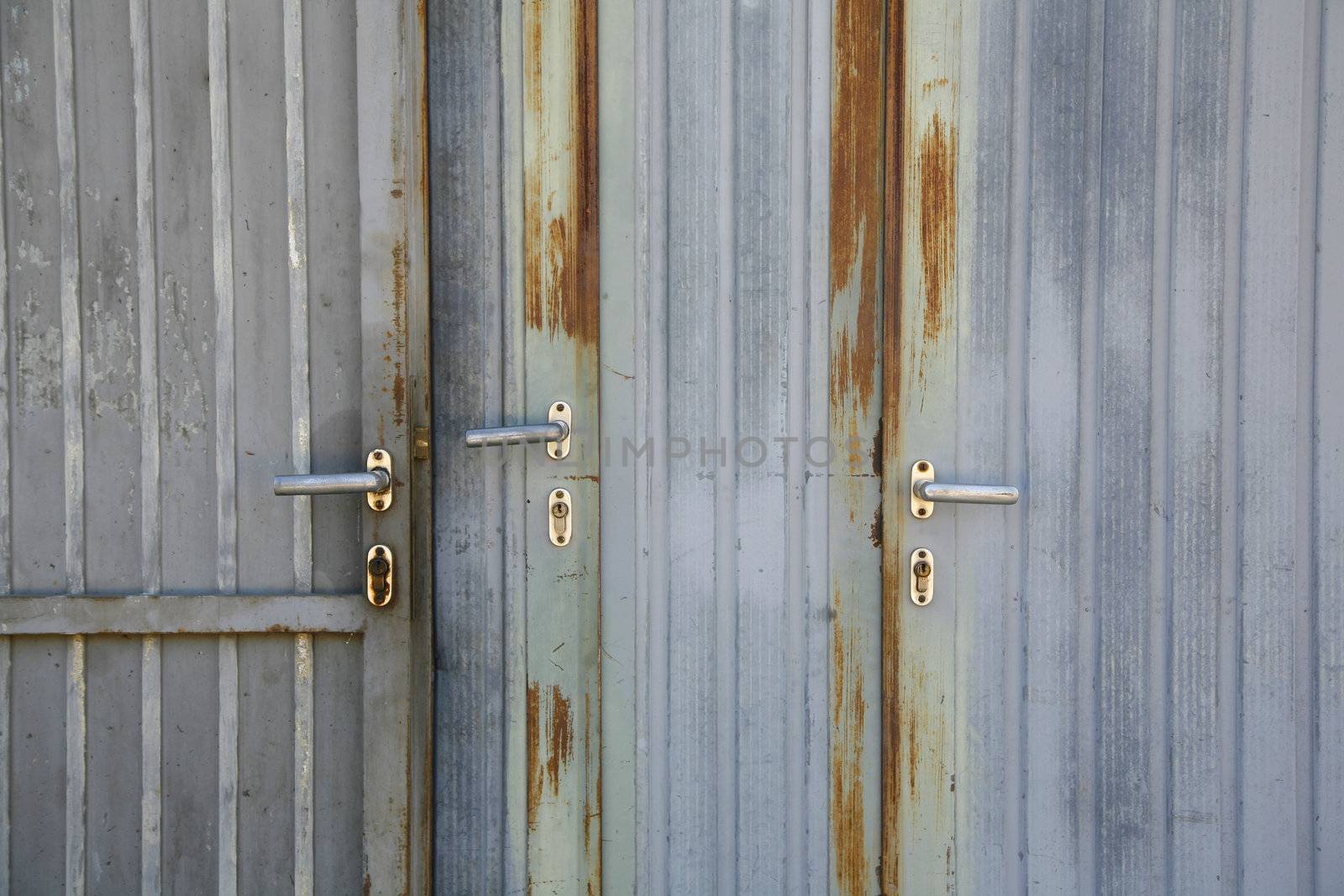 Three doors in old garage.