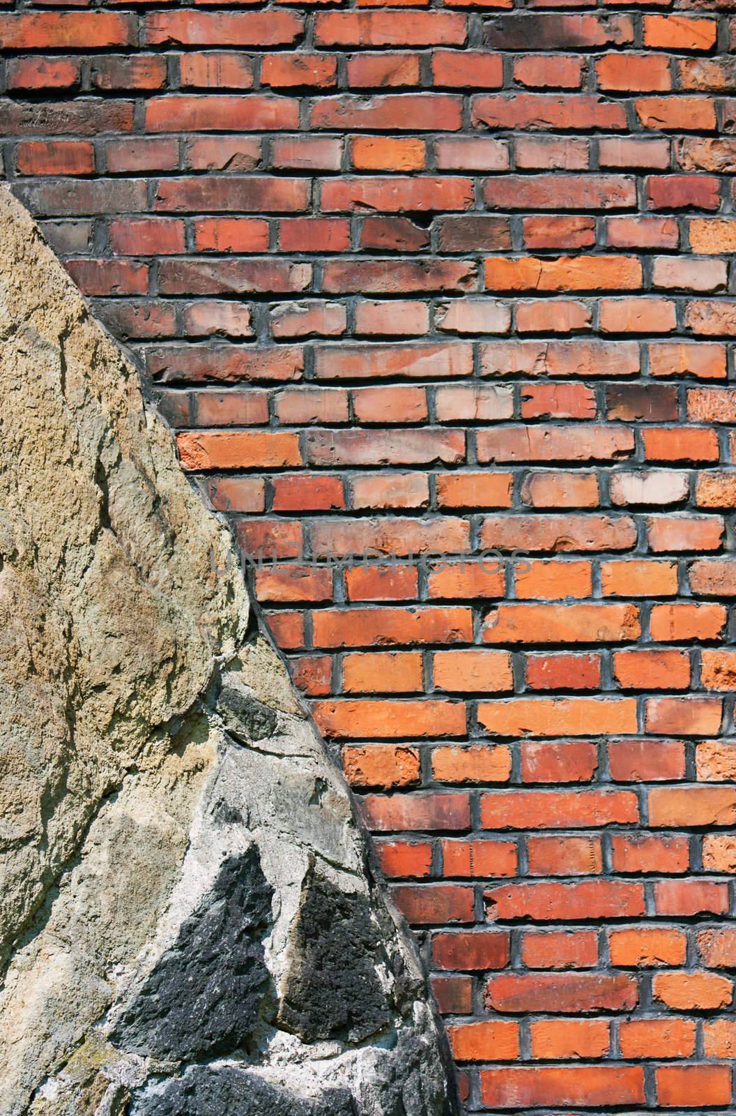 Background of old brick wall built on rock