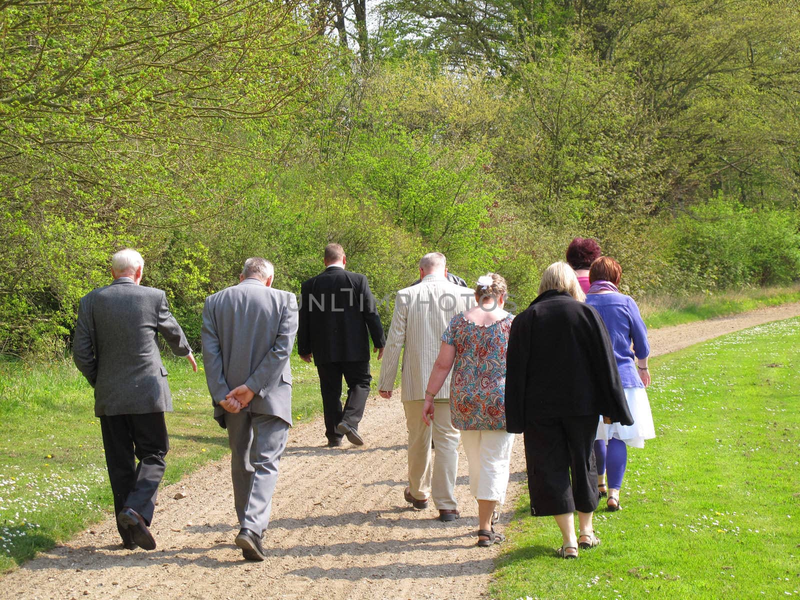 Family walking in the park at springtime - Denmark.