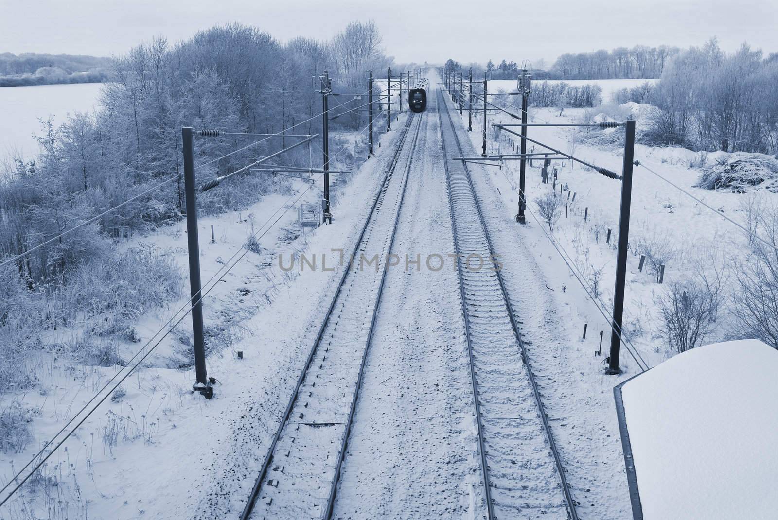 Danish intercity train on a cold December day in the countryside.