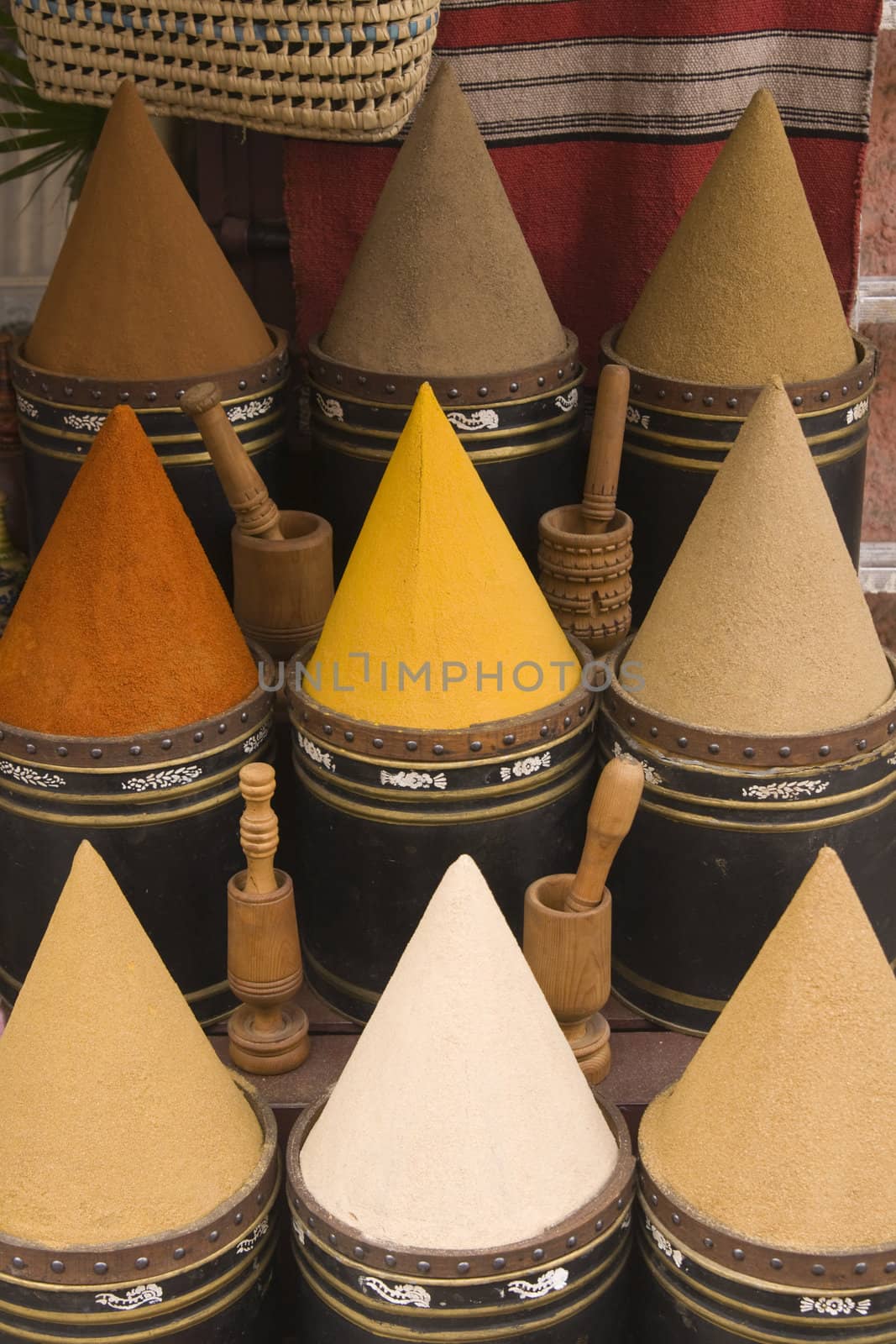 Display of spices on a market stall in the main souk in Marrakesh, Morocco.