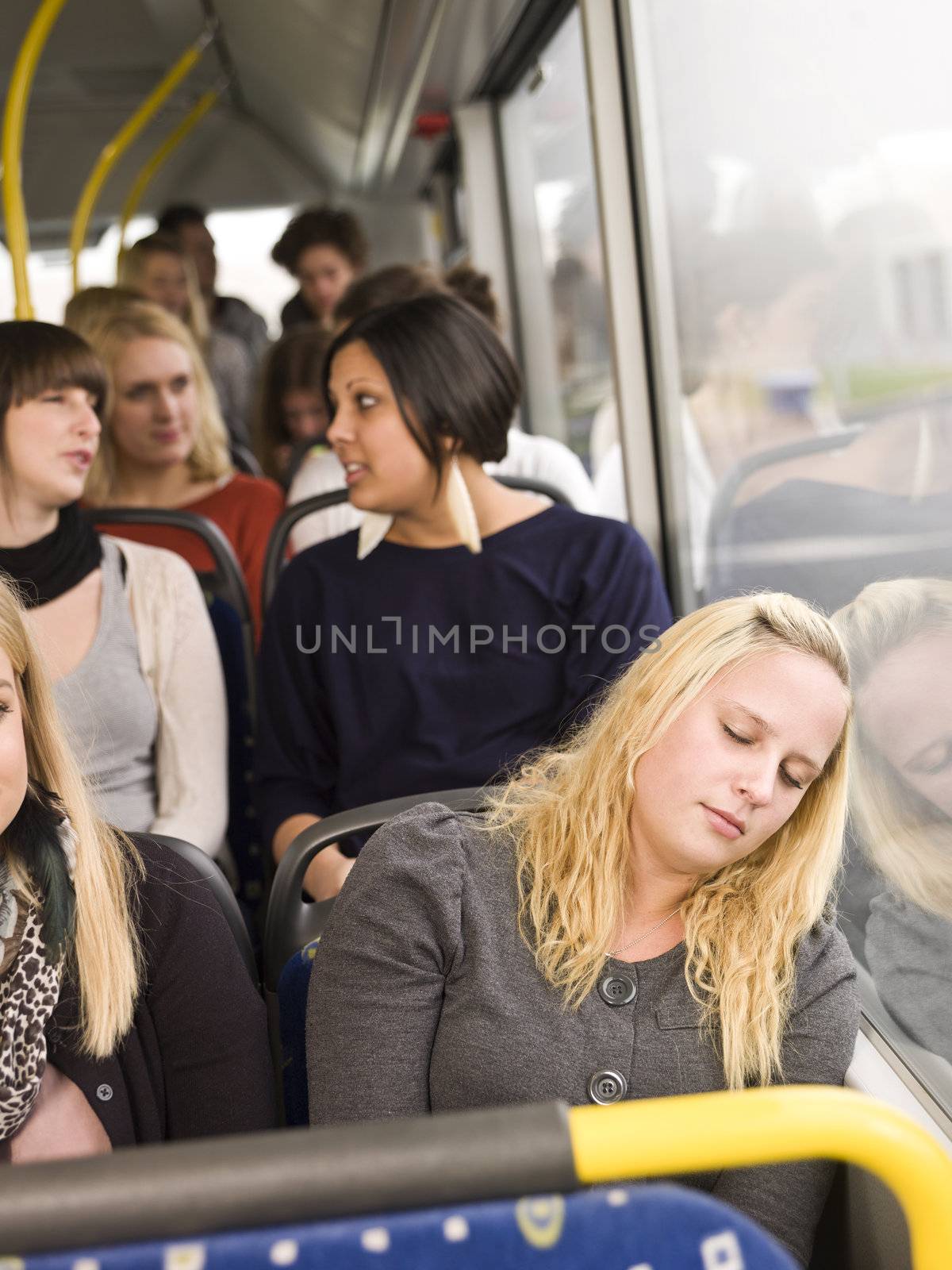 Woman sleeping on the bus