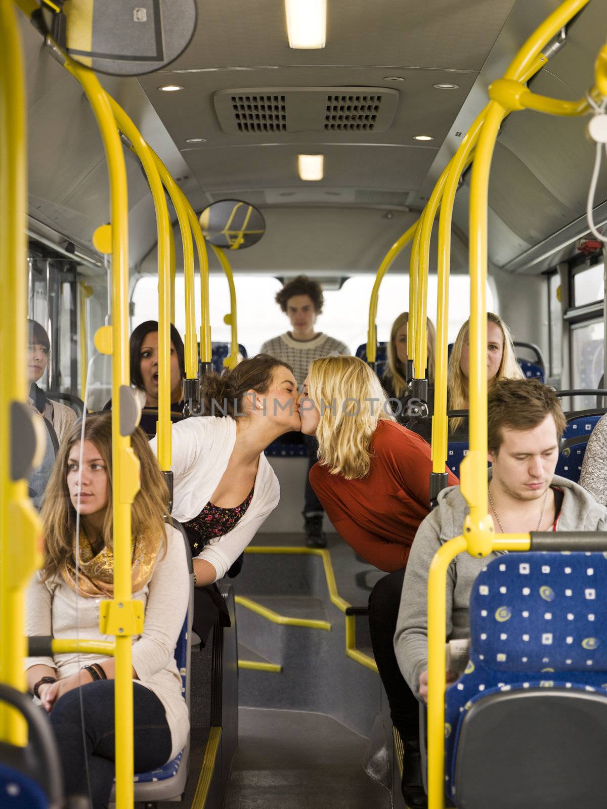 Kissing women on the bus