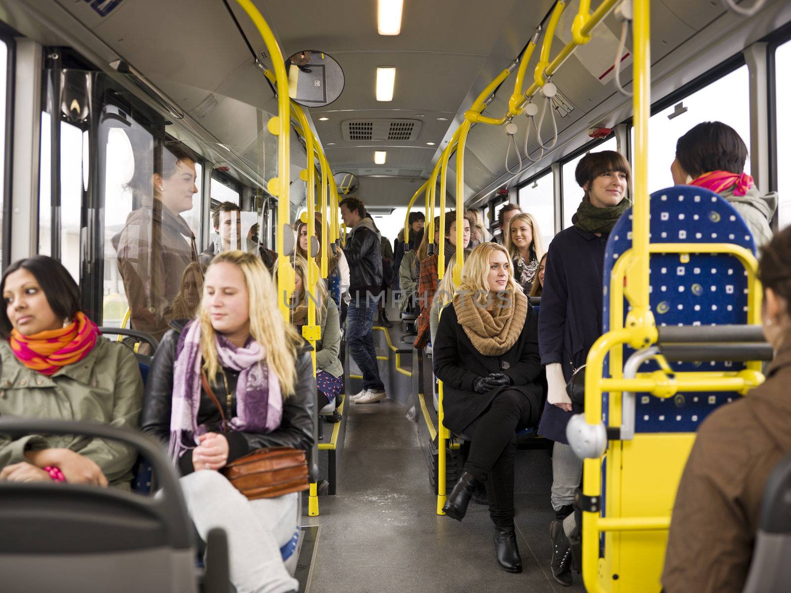 Large group of People going by bus