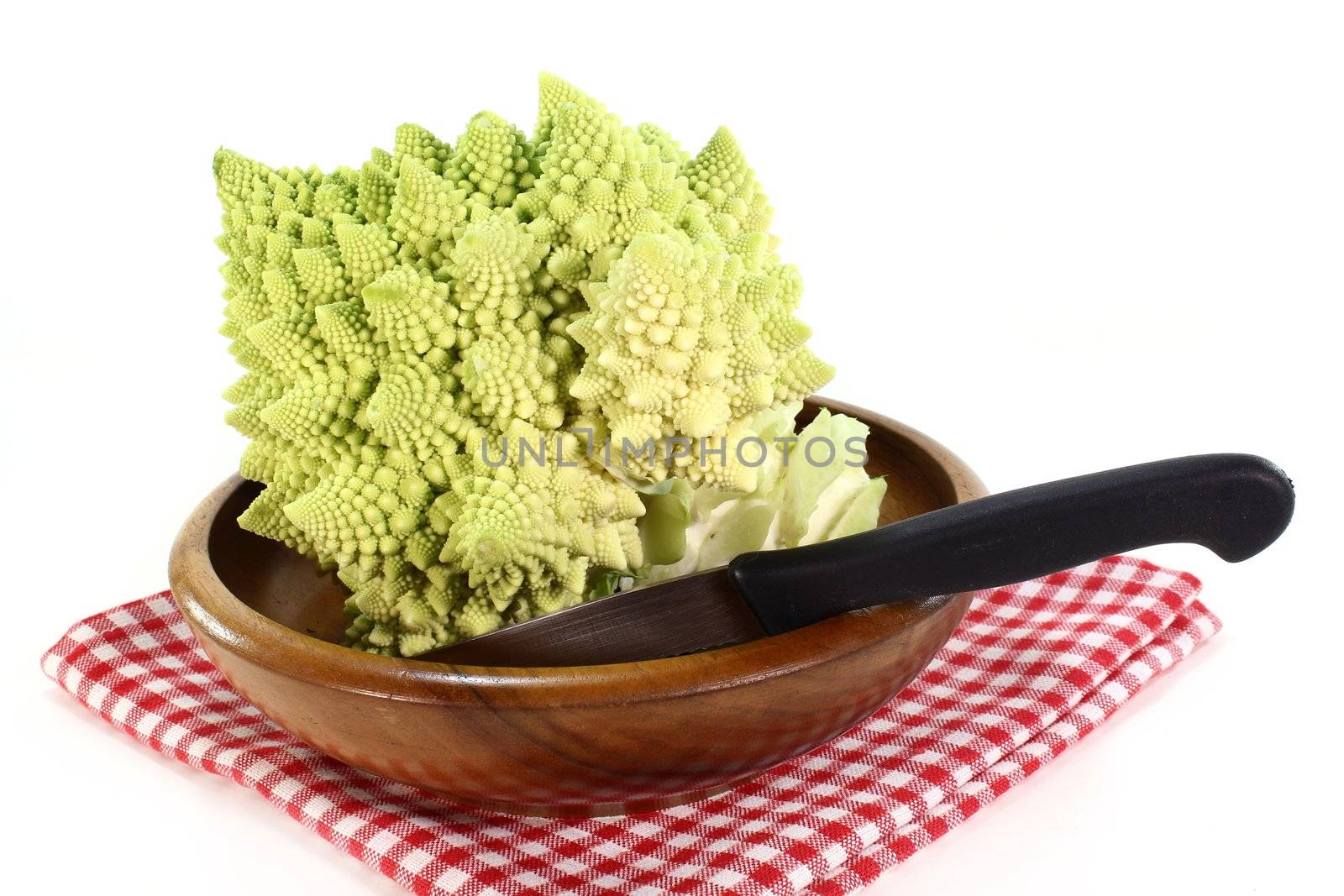 a fresh, raw Romanesco on a white background