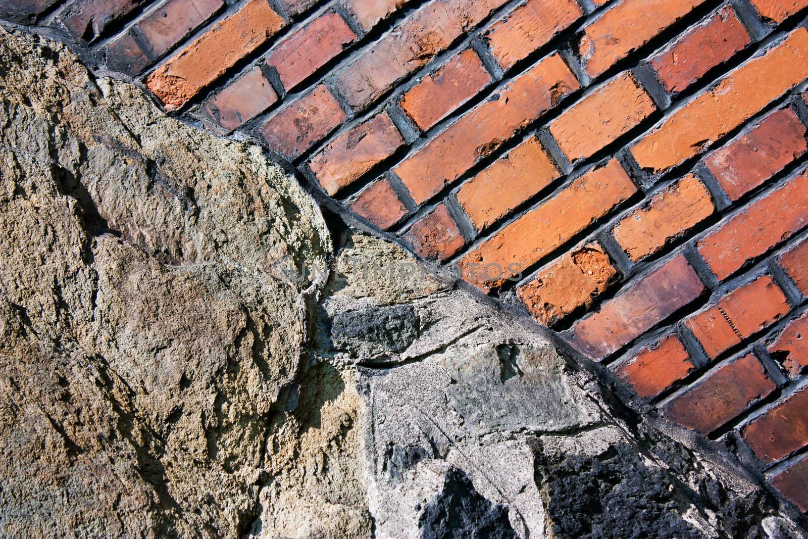 Background of old brick wall built on rock