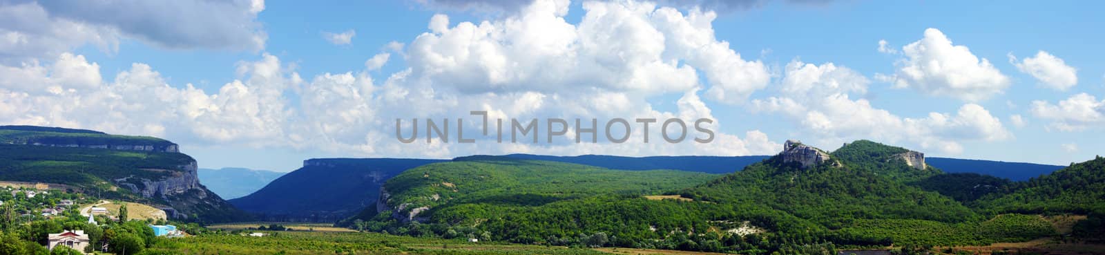 Amazing mountains and fields with blue sky  by dolnikow