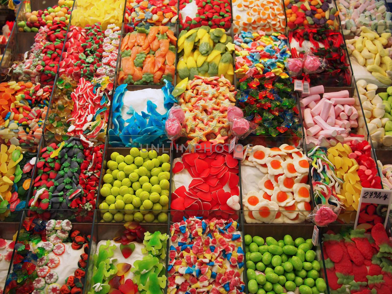 Colorful candy at the candy shop at the market of Boqueria in Barcelona, Spain.