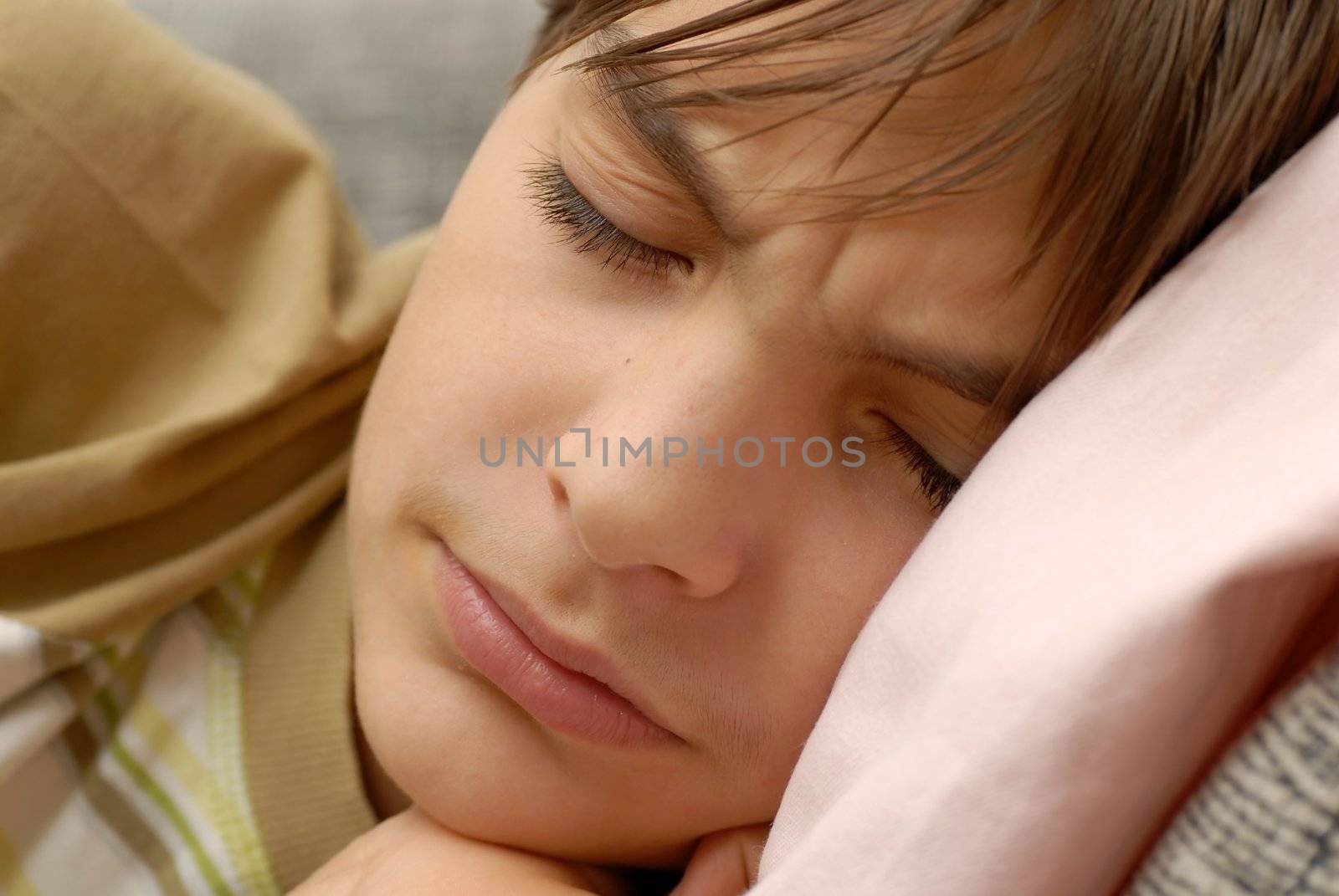 caucasian boy portrait, dreaming bad dreams closeup