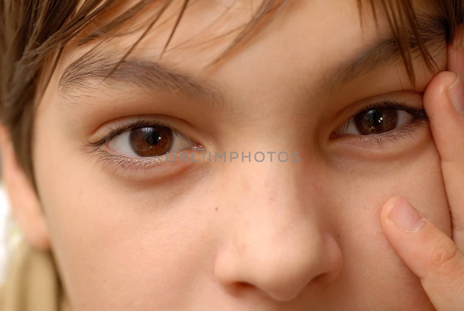 caucasian boy portrait, beautiful brown eyes closeup macro