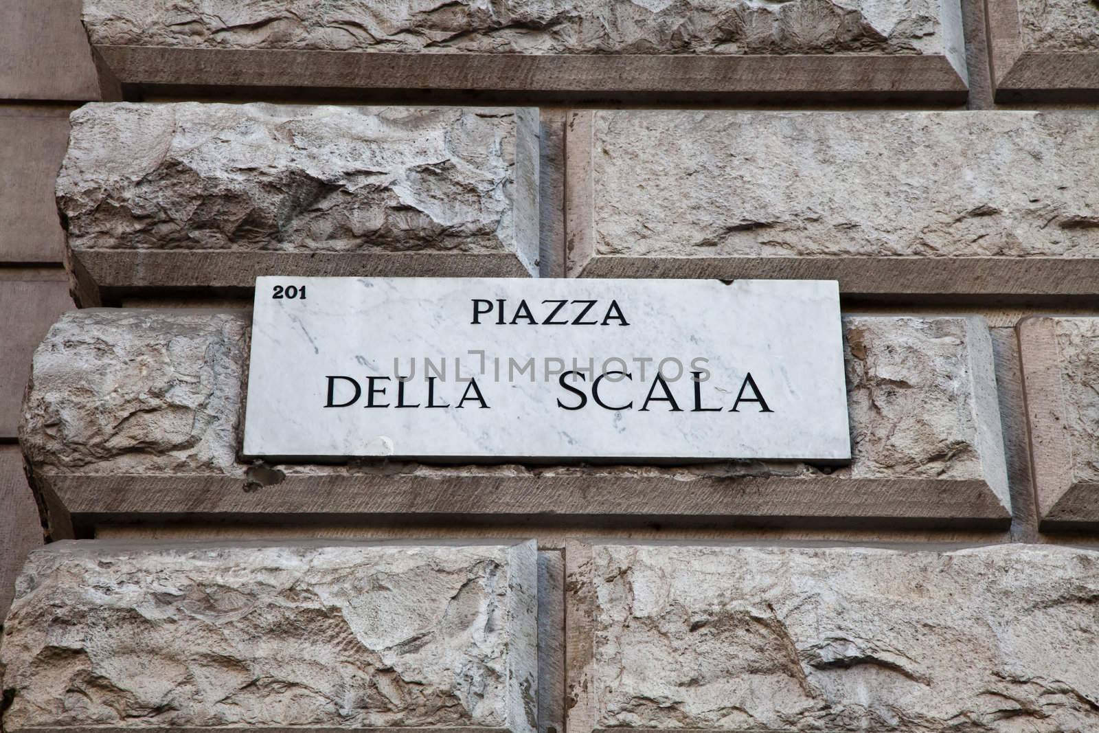 Street sign of famous interesting point in Milan center - Italy