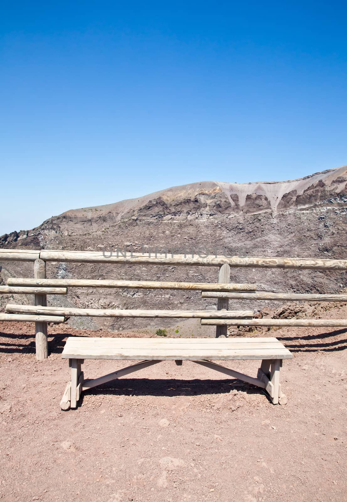 Empty bench in front of volcano Vesuvius crater. This bench is used during trekking