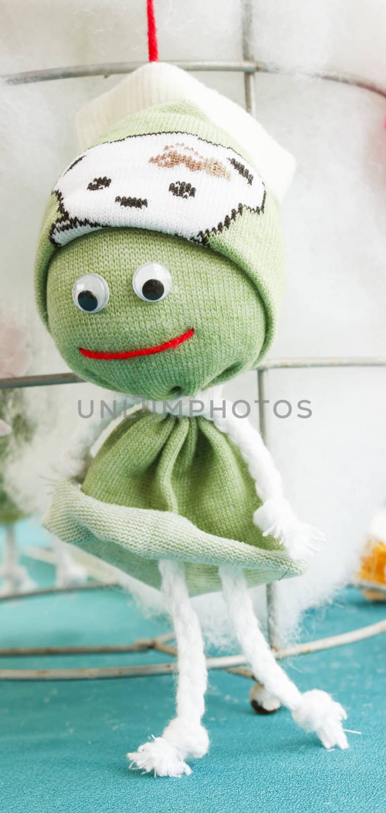 Handmade green sock doll