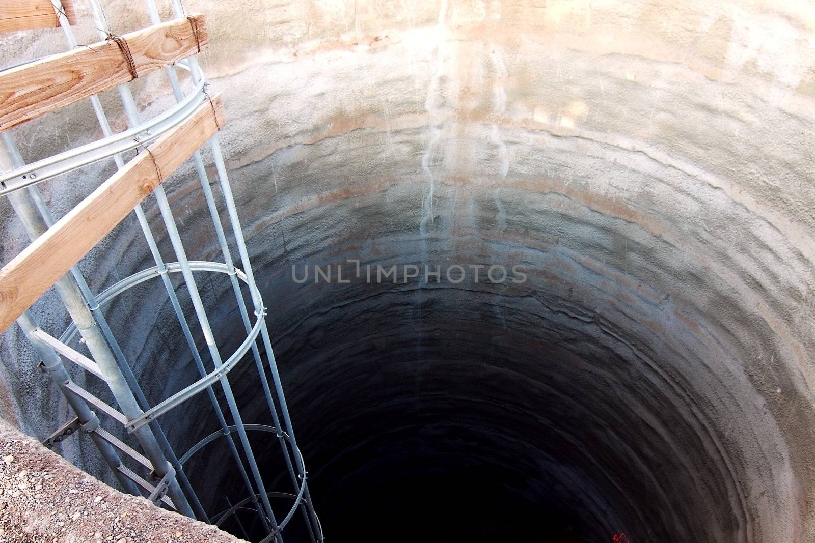 concreted hole under the ground close up