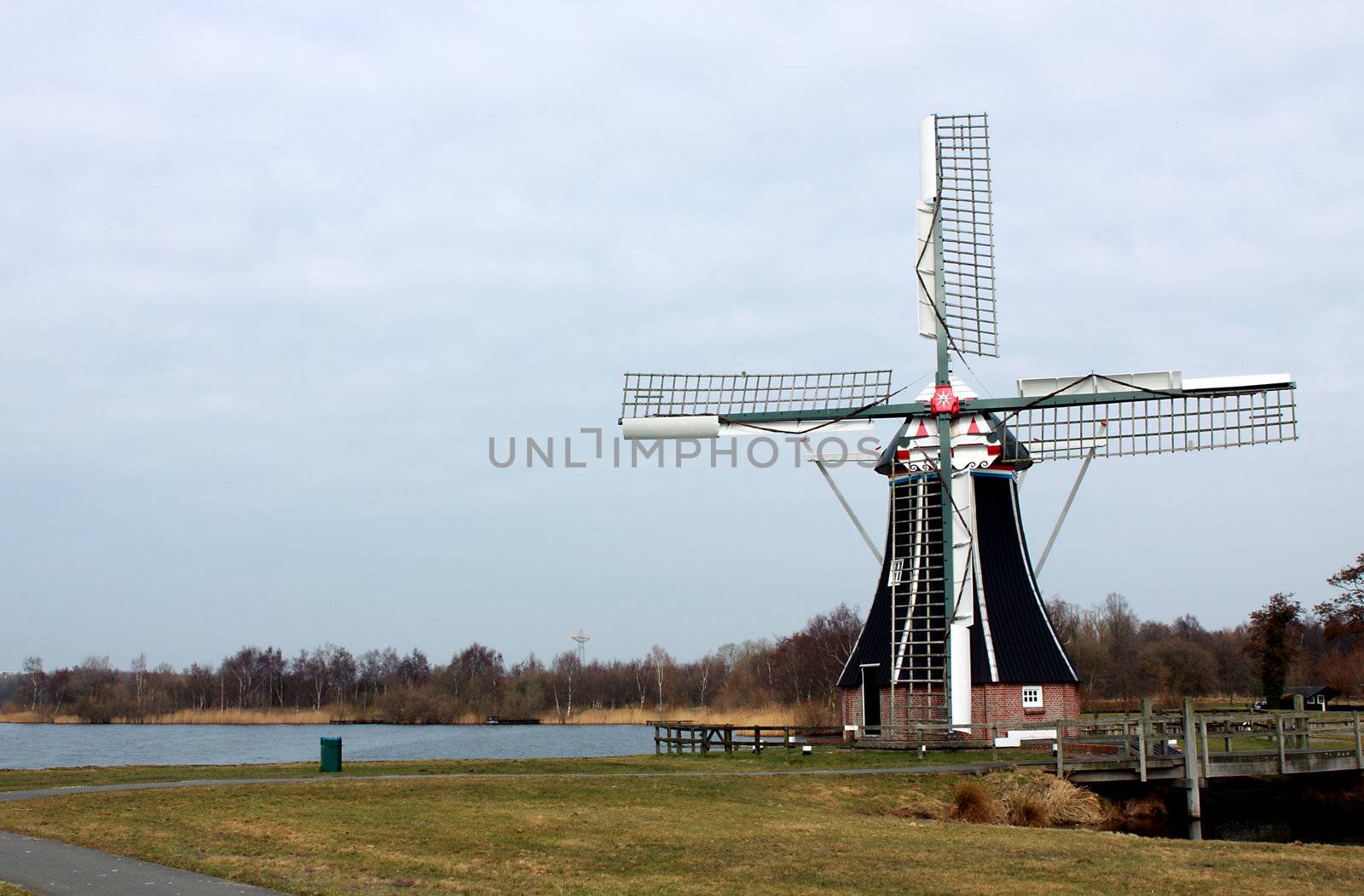 windmill over sky outside in the Netherlands by catolla