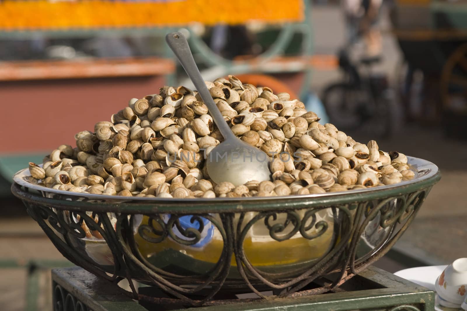 Cooked snails for sale on a market stall in the Jemaa el Fna (square) in the center of Marrakesh, Morocco