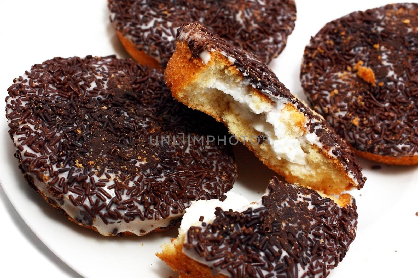 delicious cookies with cream and chocolate isolated