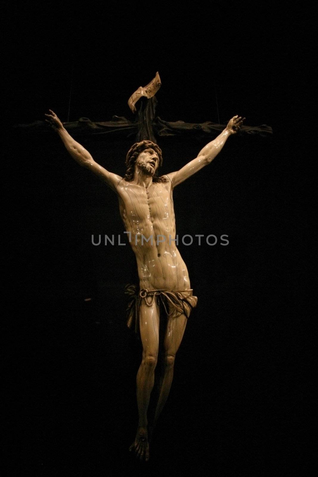 crucifix against black background