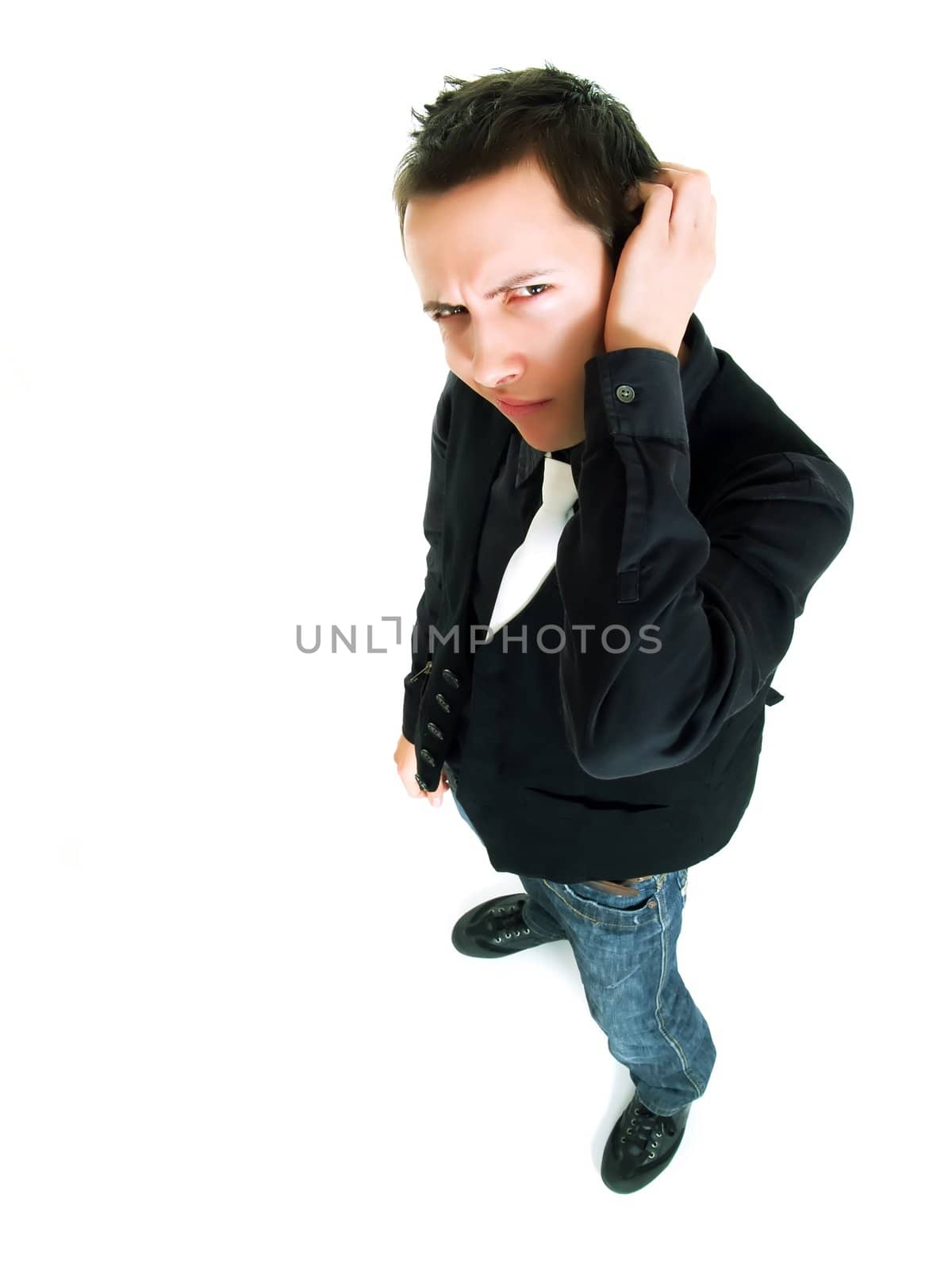 Young man thinking over a white background