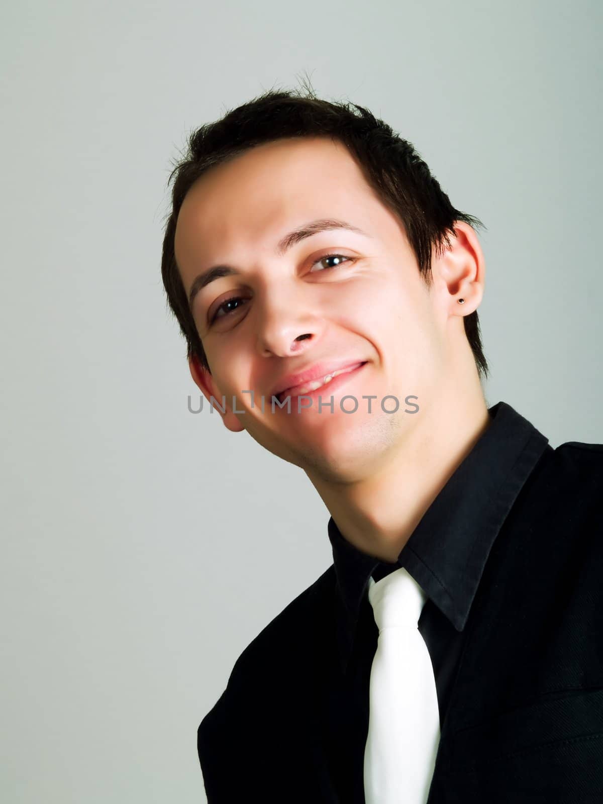 Young businessman smiling