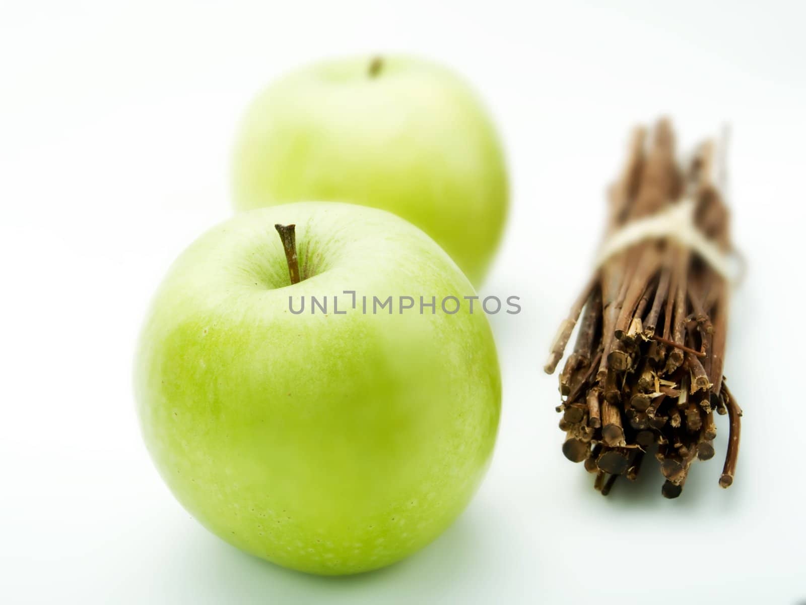 Green apples on a white background