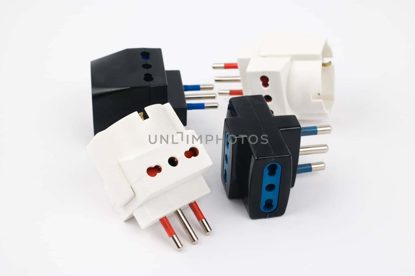 Elecrical triple plugs on white background