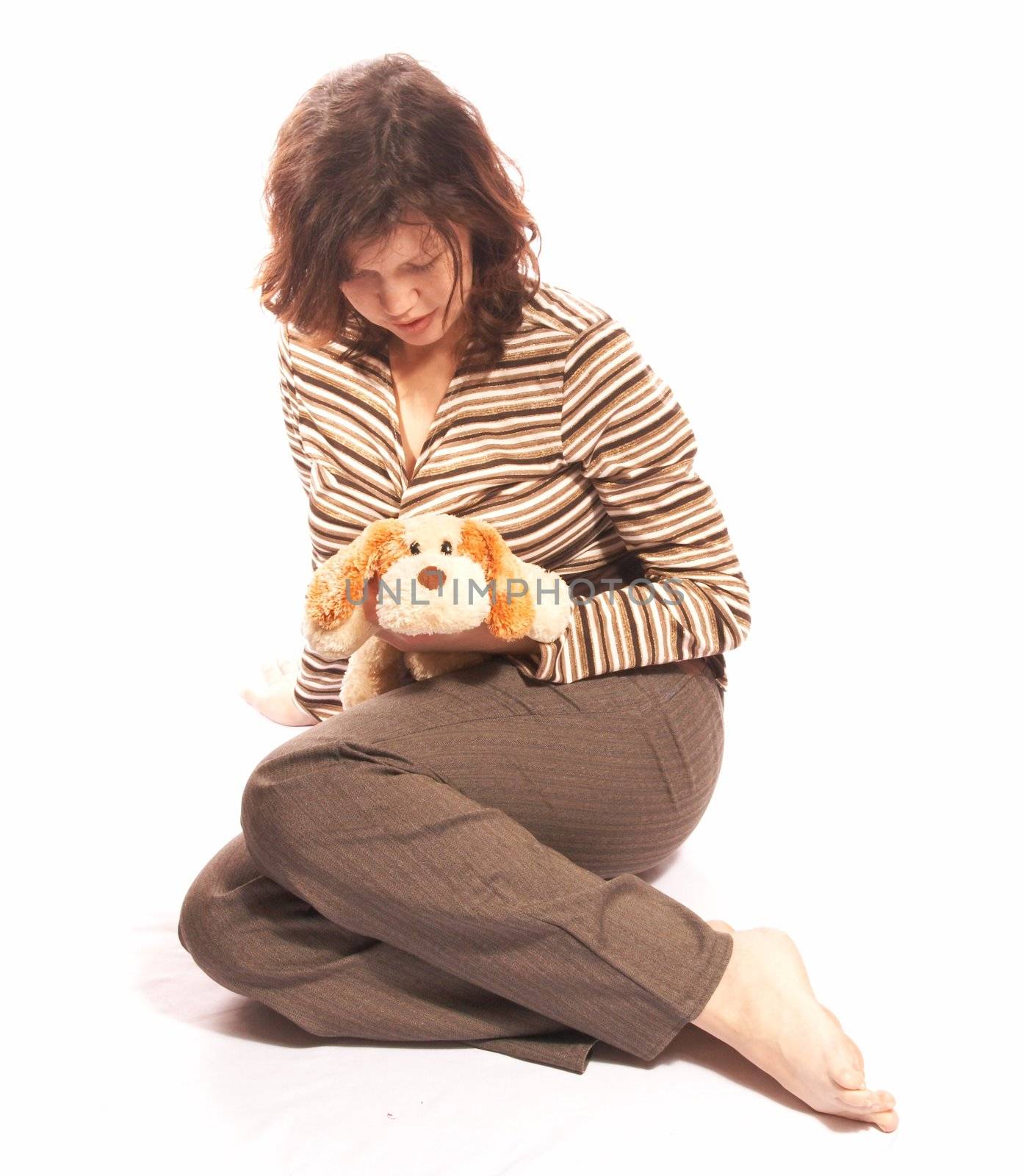 The girl in a striped jacket on a white background