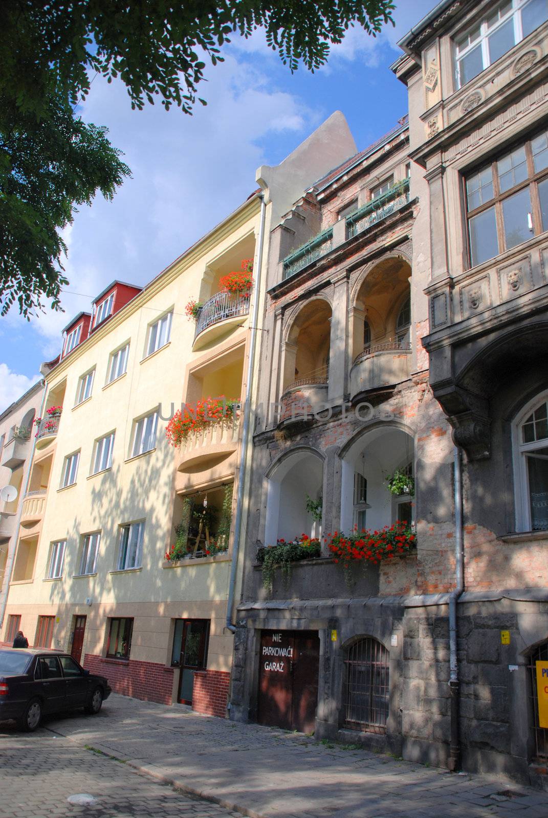 Old and new building. Sudecka Street, Wroclaw, Poland.