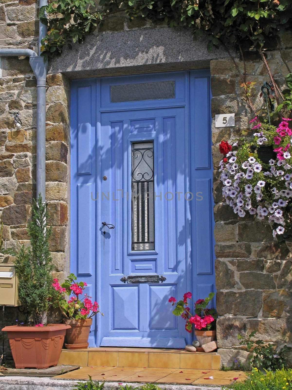 A blue door near Le Vivieur, Brittany, in the North of France.