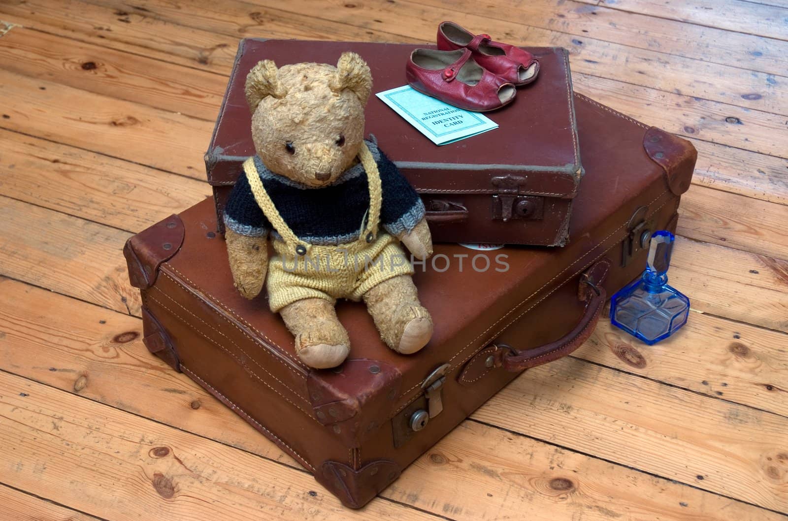 Suitcases, a Teddy Bear and travel accessories from the 1940s