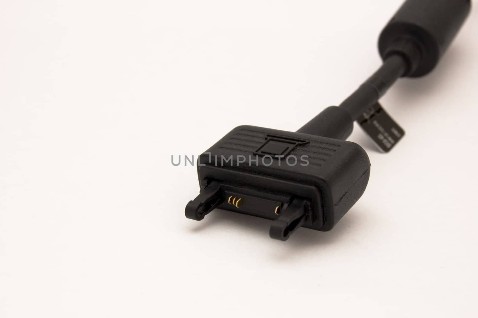 black cellphone's cable isolated on white