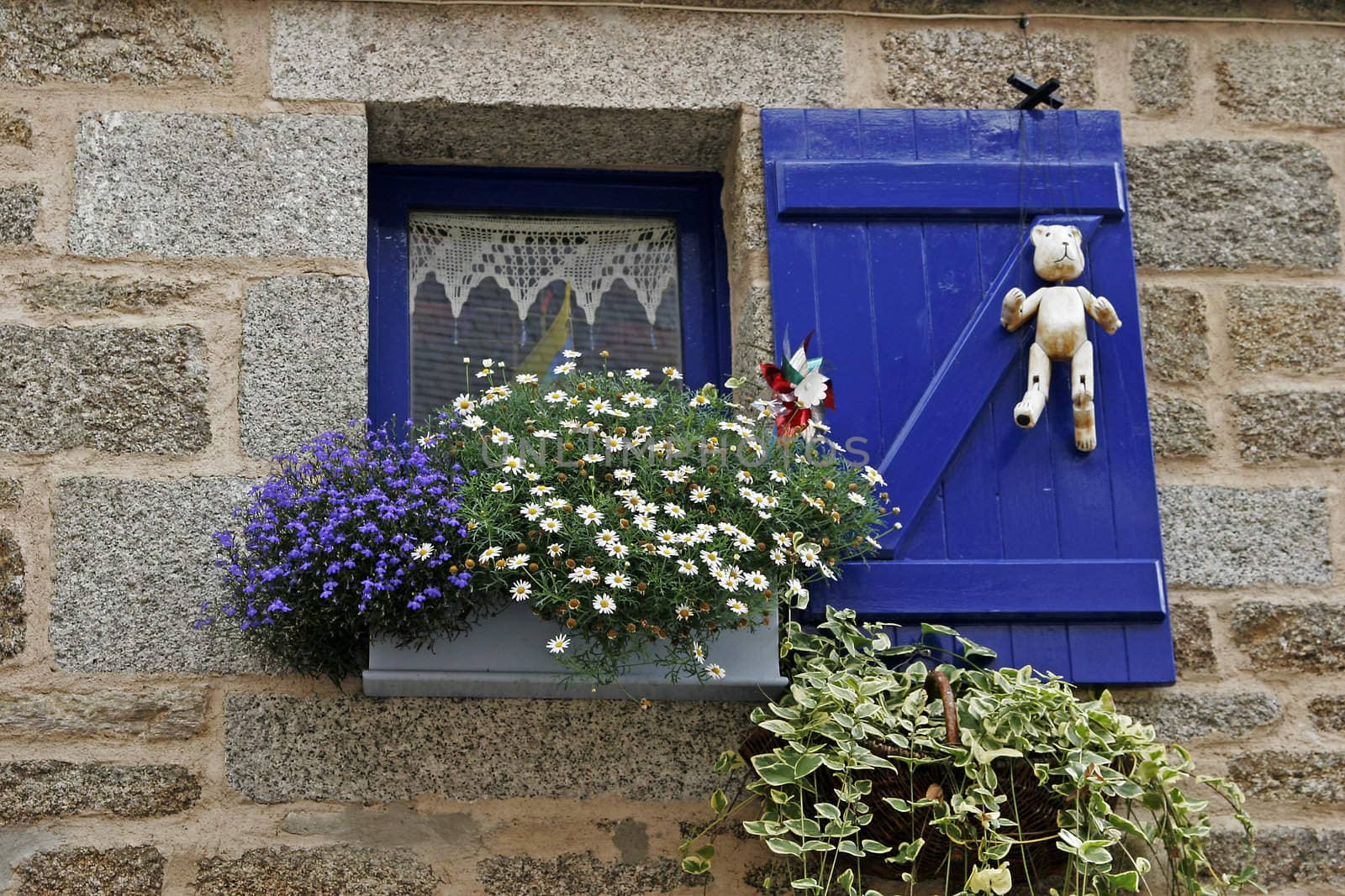 A blue window in Concarneau, Brittany, North France.