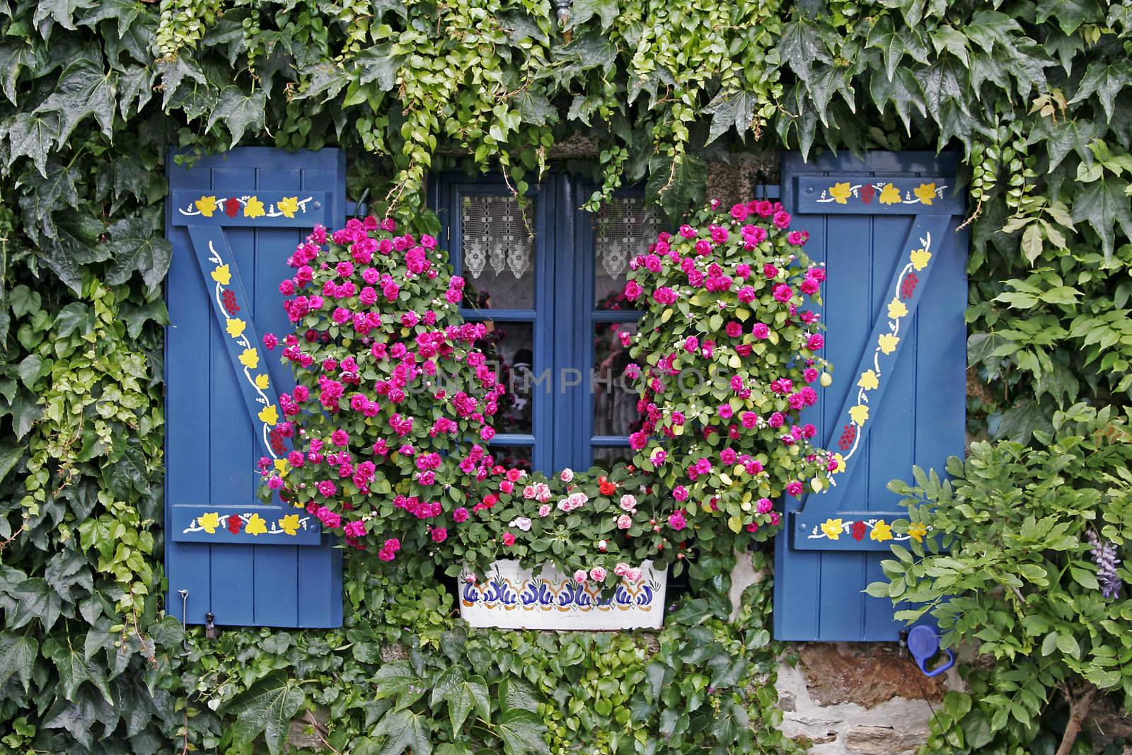 A blue window in Concarneau, Brittany, North France.