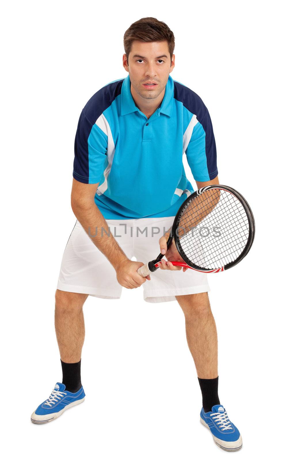 Photo of a young man playing tennis over white background.