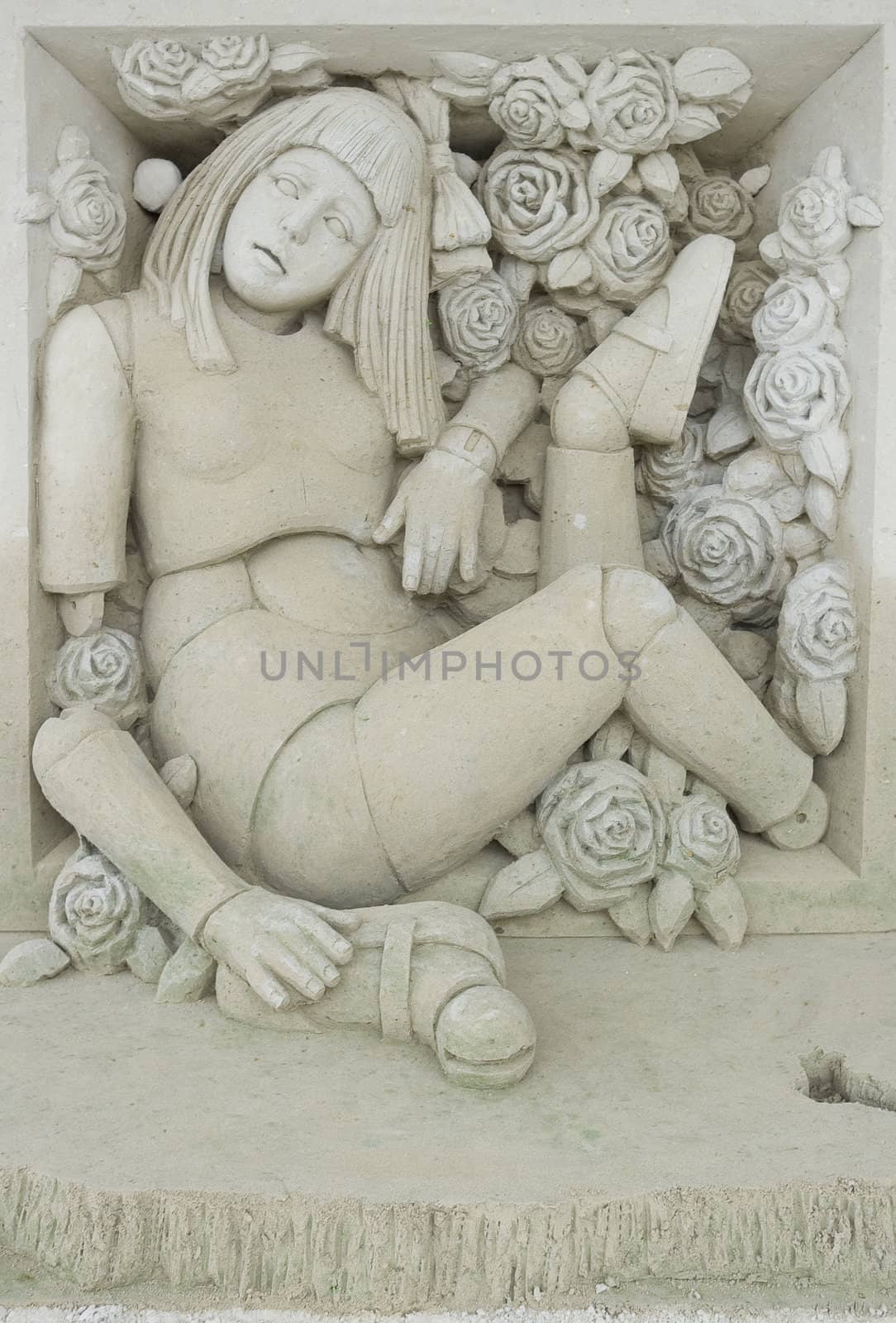 NITRA, SLOVAKIA - JULY 20: Doll in the box by the Japanese Katsuhiko Chaen at the Golden Sand Festival July 3 - August 14, 2011 in Nitra, Slovakia. Chaen is Japans most famous sand sculptor graduated from Musashino Academy of Art, Tokyo.