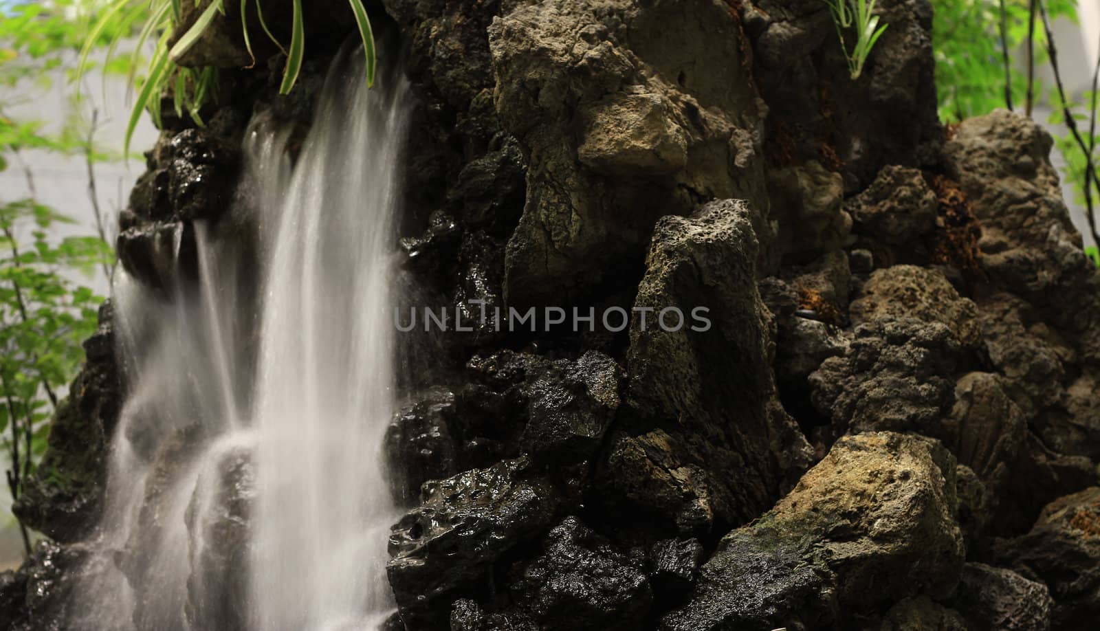 Water flowing on the rocks - water flow in silk effect.