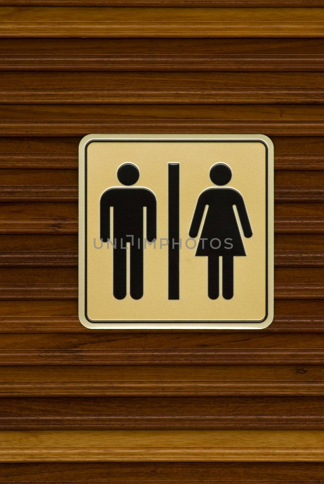 Toilet sign on wooden door