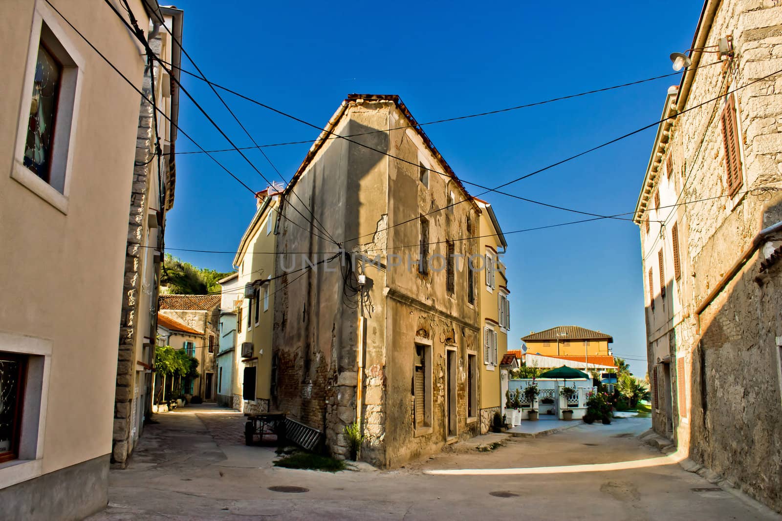 Narrow streets of Susak - traditional dalmatian architecture, Croatia