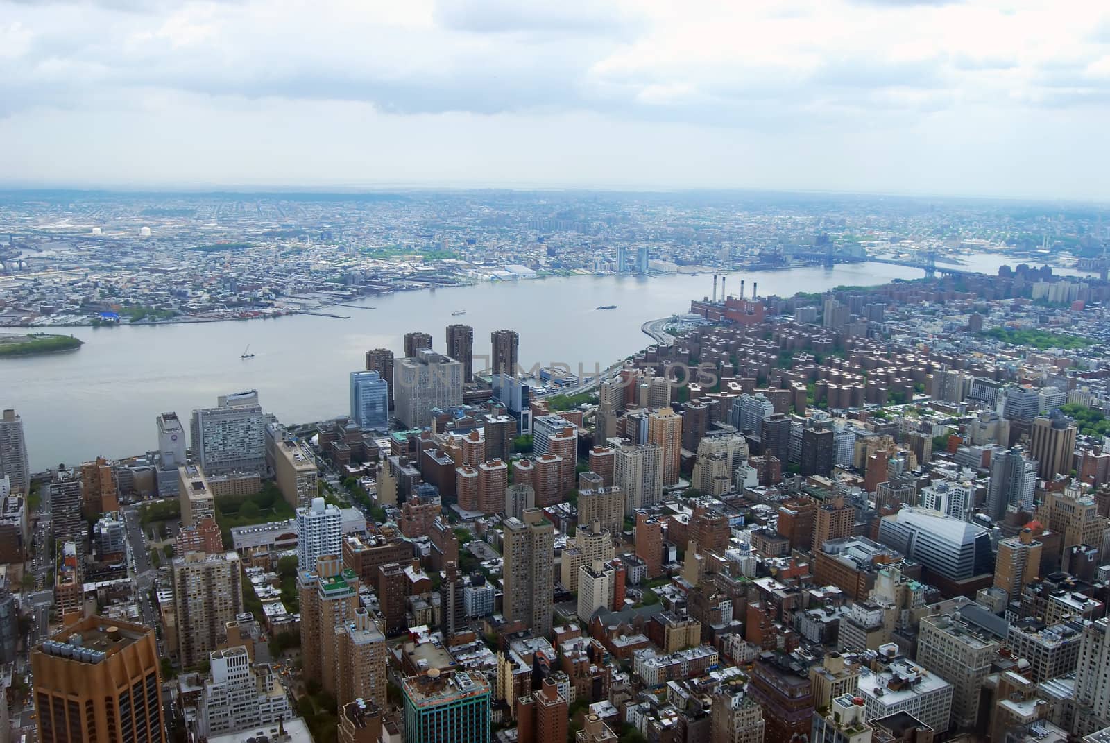 Aerial view of Manhattan Island and the hudson river looking northwest from the 102nd floor observation deck of the empire state building.