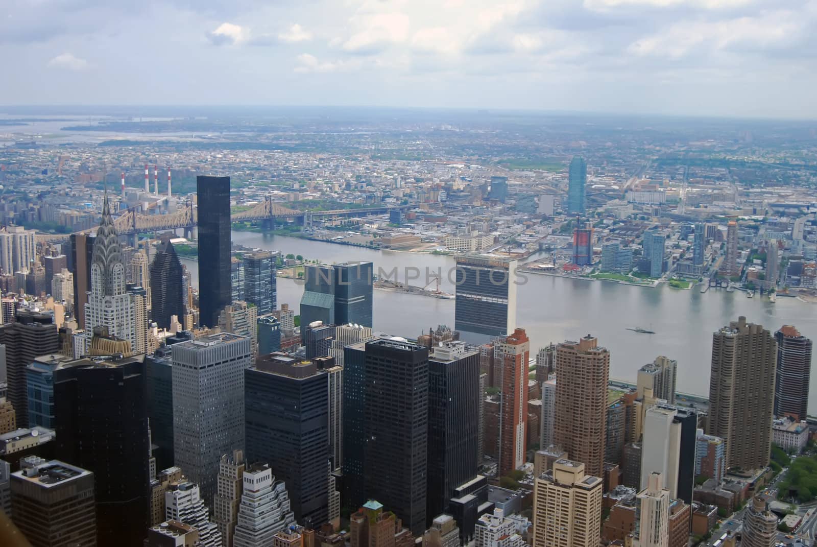 Am aerial view of Manhattan and the suburbarn communiteis of Long Island looking southeast from the 102 floor of the  empire state building.
