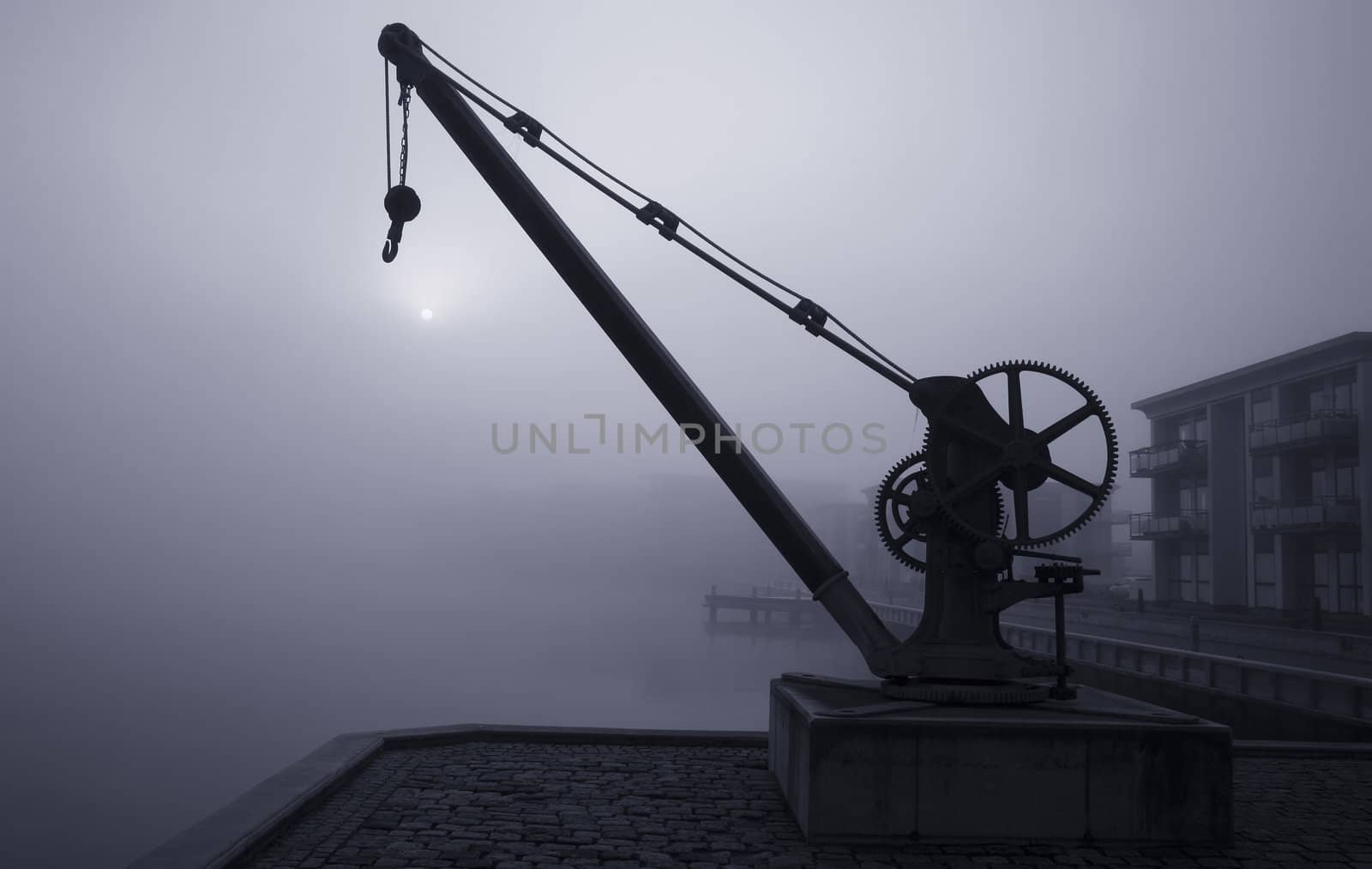 A frosty, foggy winter morning at the waterfront of Nyborg, Denmark.