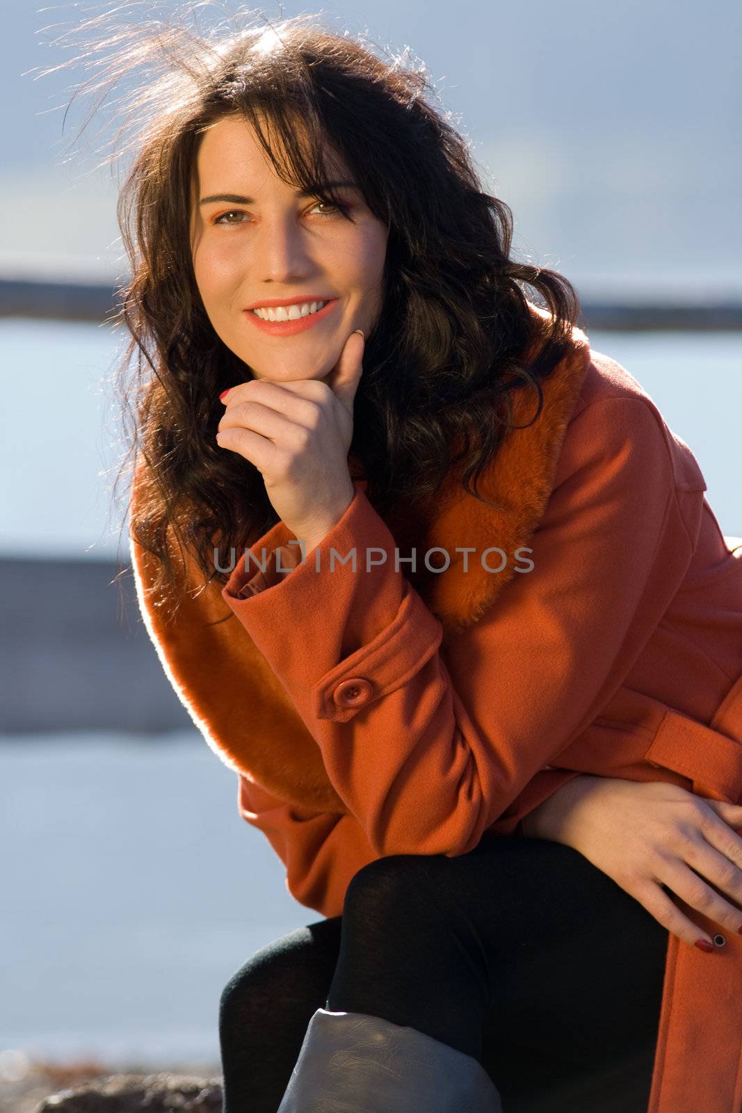 Laughing fashionably dressed woman by STphotography